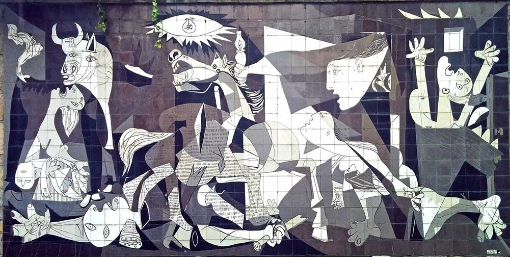 An outdoor mural of Picasso's Guernica at the Basque Parliament