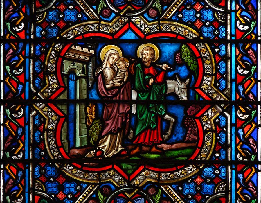 Gothic stained glass at the Notre Dame cathedral in Paris. 