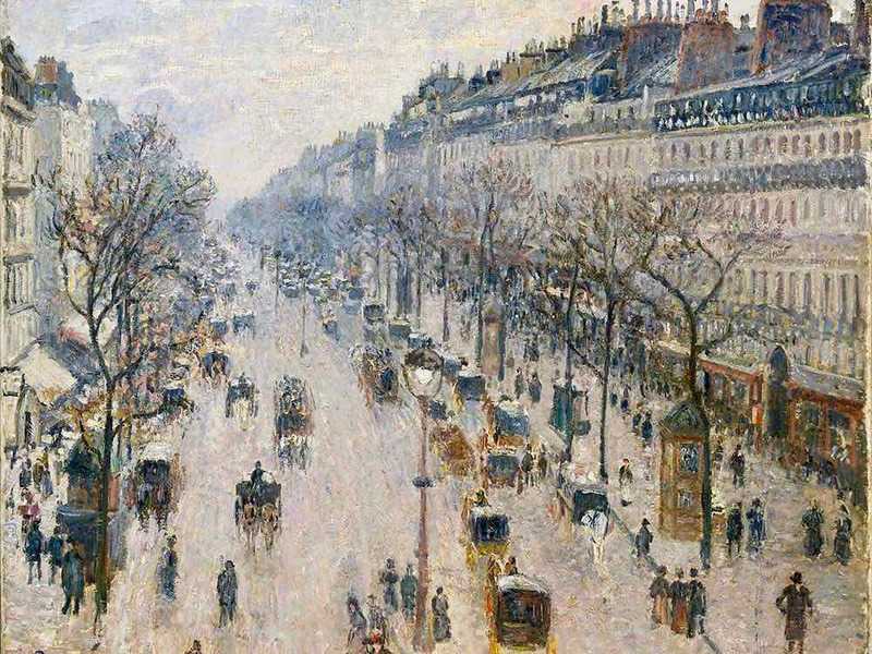 The bustling Boulevard Montmatre by day by Pissarro